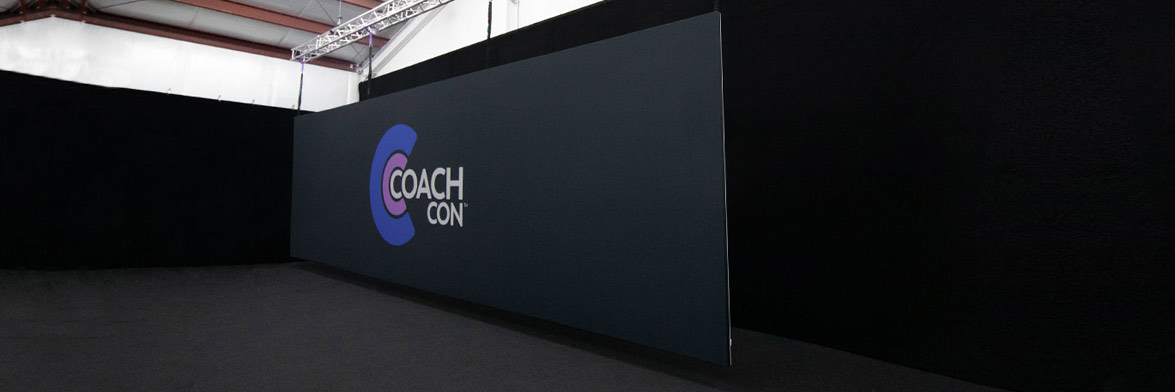 A Borderless Graphic Panel for Coach Con, featuring their logo.