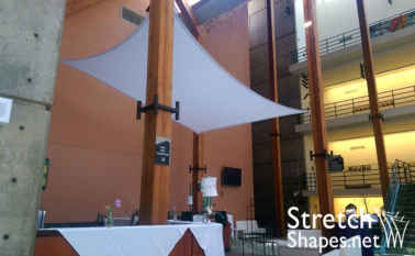 Stretch Fabric Lounge created with spandex scrim sails as ceiling decor
