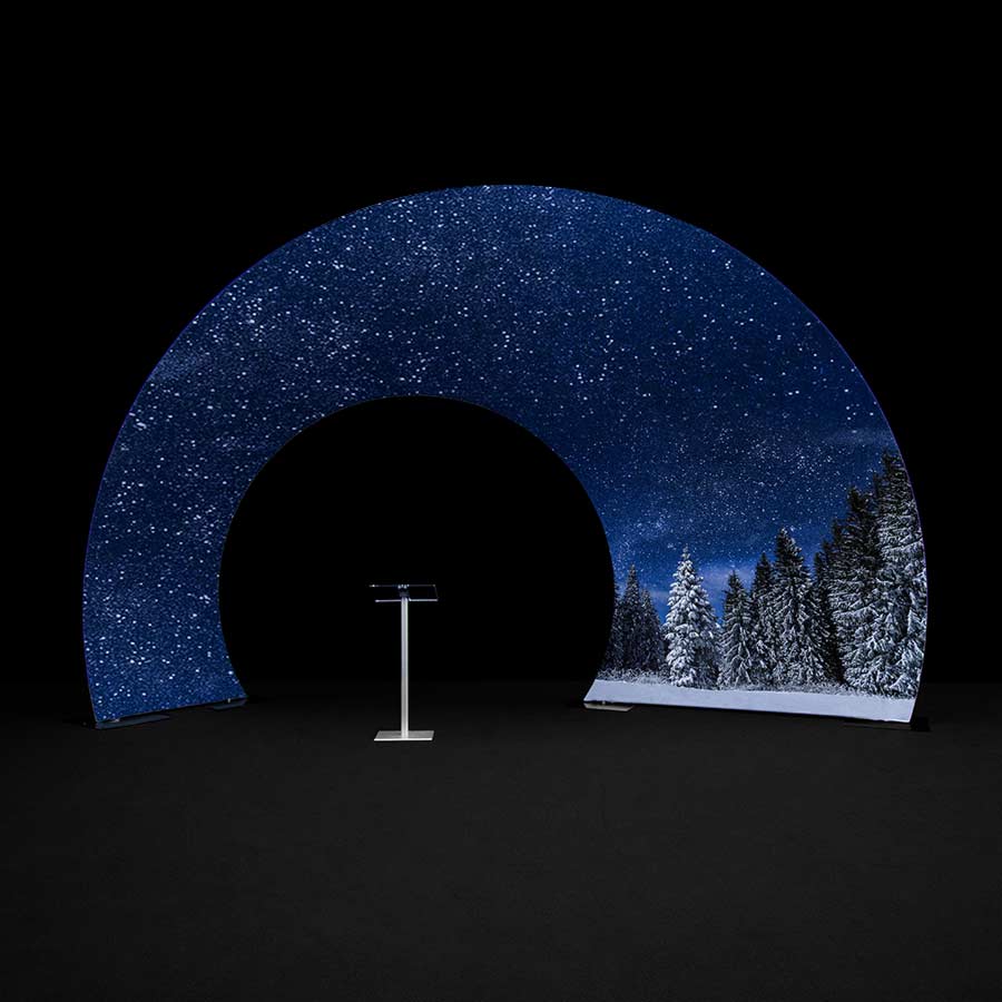 Event Arch printed with a snowy forest mountain scene