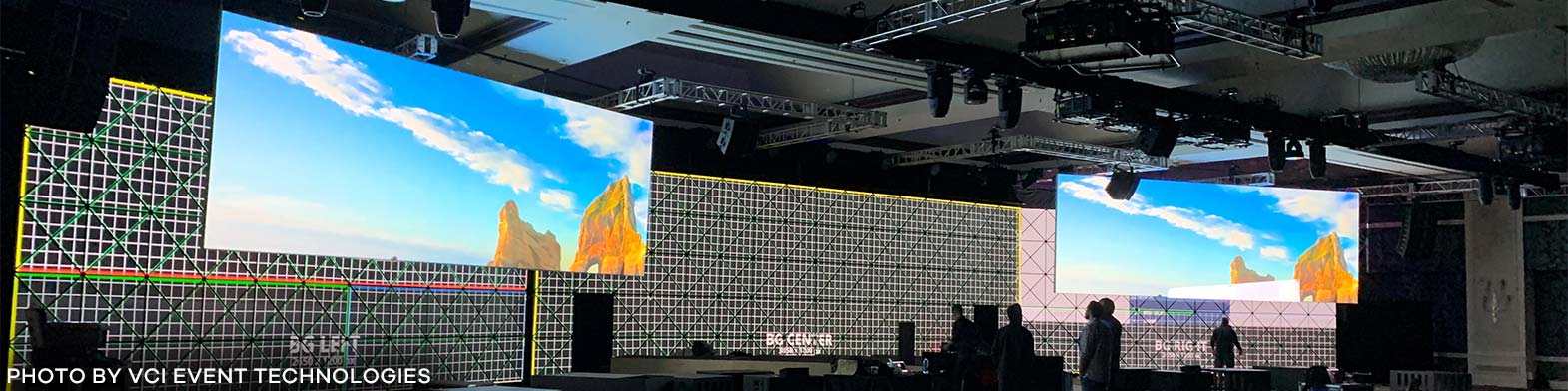A pair of Borderless Projection Screens with a beautiful vista projected onto them.