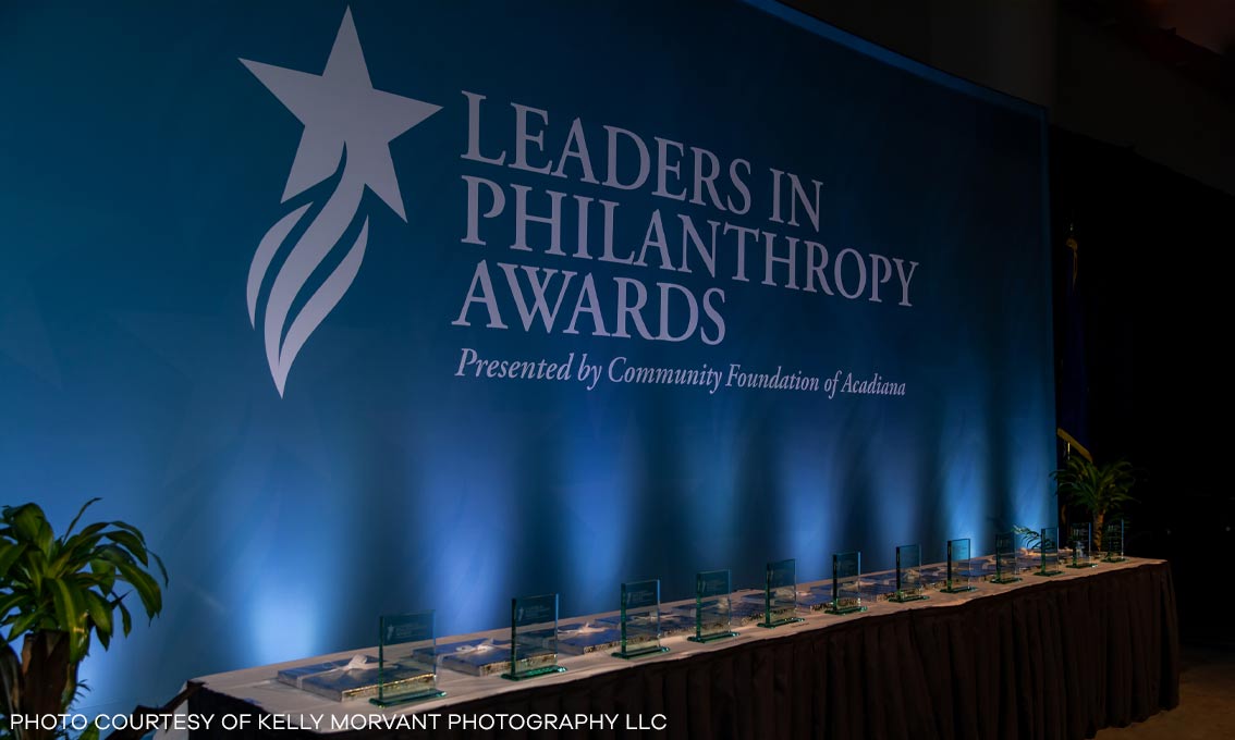 A blue printed Quick Wall for the Community Foundation of Acadiana Leaders in Philanthropy Awards. Photo courtesy of Kelly Morvant Photography LLC